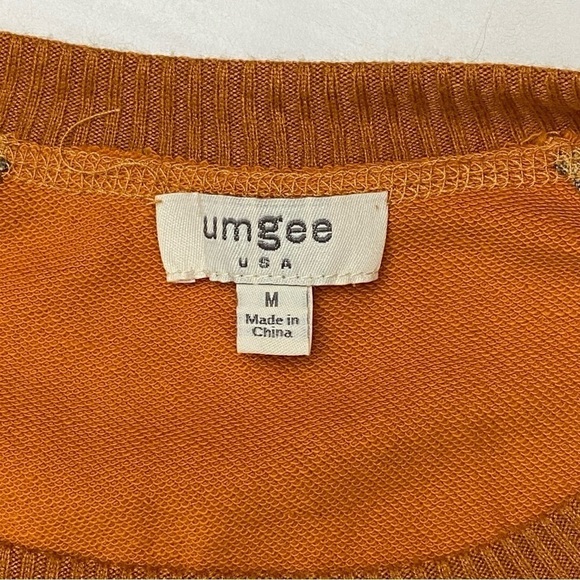 Umgee French Terry, animal print raw edge detail tunic with side slits medium - Picture 4 of 14